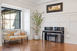 Living area with hardwood / wood-style floors