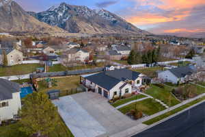 Aerial view at dusk featuring a mountain view