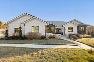 View of front of home featuring a front yard