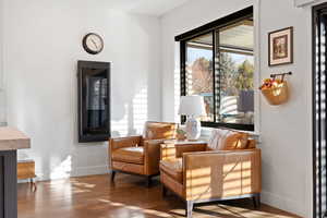 Living area featuring hardwood / wood-style flooring