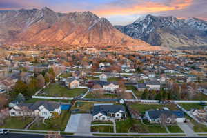 Aerial view at dusk featuring a mountain view