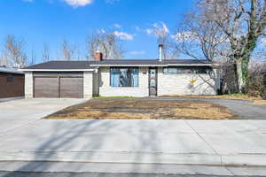 Ranch-style home with a garage