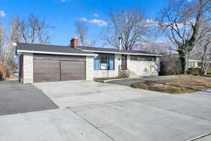 Single story home with a garage