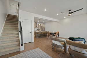 Interior space featuring ceiling fan and wood-type flooring