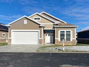 Craftsman-style home with a garage