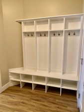 Mudroom featuring hardwood / wood-style floors