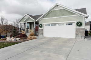 Craftsman-style home with a garage