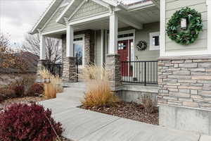 Entrance to property with covered porch