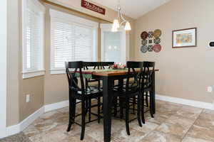 Dining area featuring a chandelier