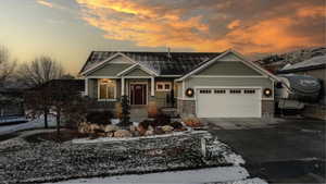 Craftsman-style home with a garage