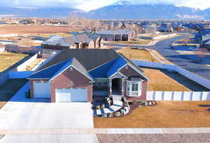 Birds eye view of property with a mountain view