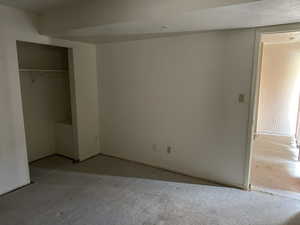 Unfurnished bedroom featuring a closet