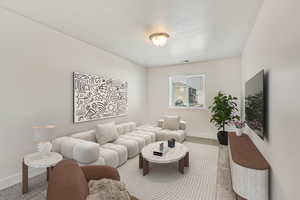 Living room featuring light colored carpet