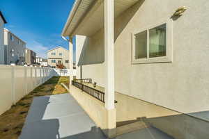 View of property exterior featuring a patio