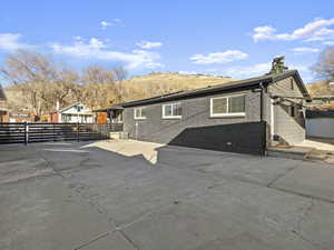 Exterior space with a patio area and central AC