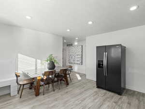 Dining room with light wood-type flooring