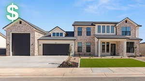 View of front of home with an attached garage, a front yard, concrete driveway, and brick siding
