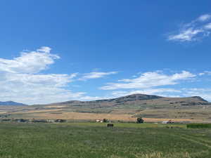 View of mountain feature with a rural view