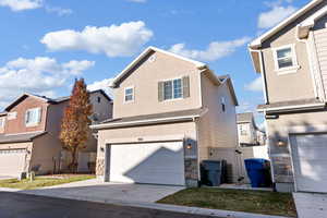 View of front property with a garage