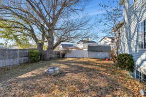 View of yard with a shed