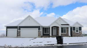 Craftsman-style house featuring a garage