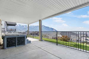 View of patio / terrace with a mountain view