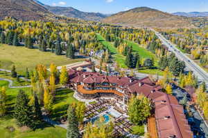 Birds eye view of property featuring a mountain view