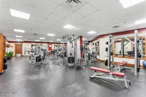 Exercise room featuring a paneled ceiling