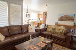 Living room with an inviting chandelier