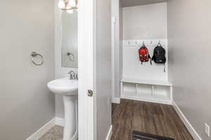 Bathroom featuring wood-type flooring