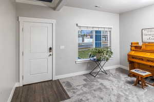 Miscellaneous room with wood-type flooring