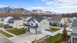 Birds eye view of property with a mountain view