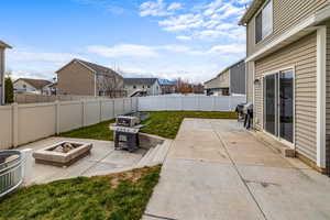 View of patio / terrace with a fire pit