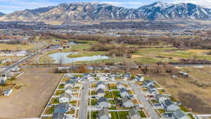 Bird's eye view featuring a water and mountain view