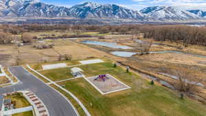 Bird's eye view with a rural view and a water and mountain view