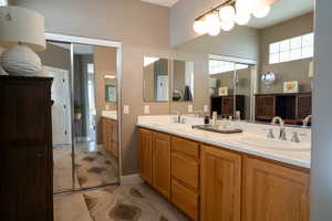 Bathroom with vanity and tile patterned floors