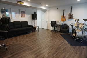 Interior space featuring dark wood-type flooring