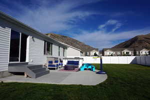 View of patio featuring a mountain view and an outdoor hangout area