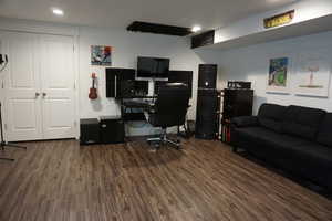 Office area featuring dark hardwood / wood-style flooring