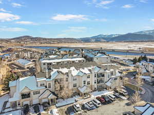 Birds eye view of property with a mountain view