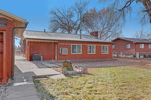 Exterior space featuring a lawn