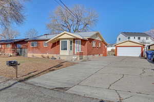 View of front of home featuring a garage