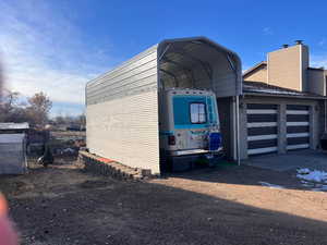 Exterior space featuring a RV  carport