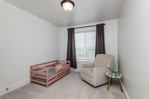 View of carpeted bedroom.