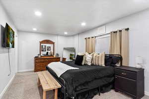 View of carpeted bedroom