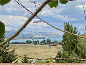 View of water feature with a mountain view