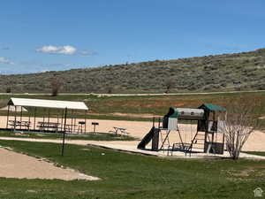 View of community featuring a playground