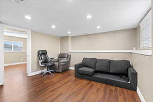 Office featuring hardwood / wood-style floors