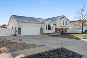 View of front of property featuring a garage