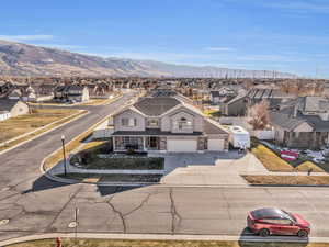 Birds eye view of property with a mountain view